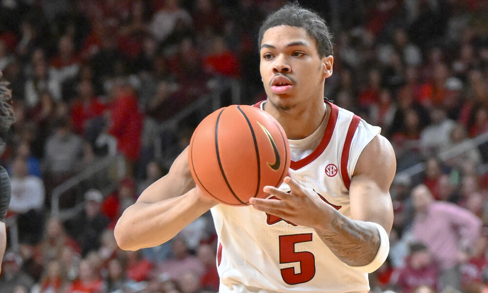 Arkansas Razorbacks guard Darius Acuff making a pass against the Fresno State Bulldogs