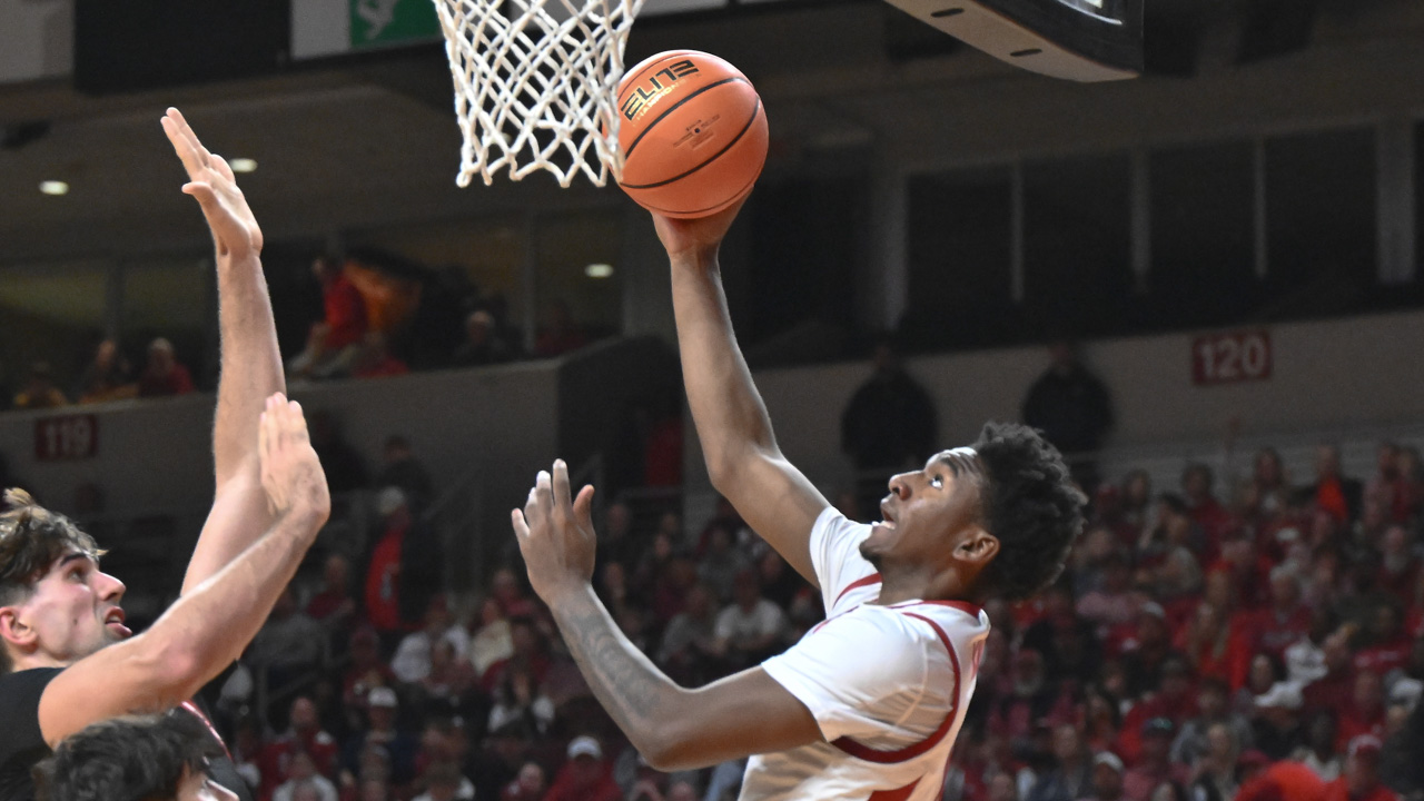 Arkansas Razorbacks guard Karter Knox laying in a shot against the Fresno State Bulldogs