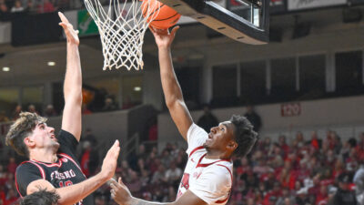 Arkansas Razorbacks guard Karter Knox laying in a shot against the Fresno State Bulldogs
