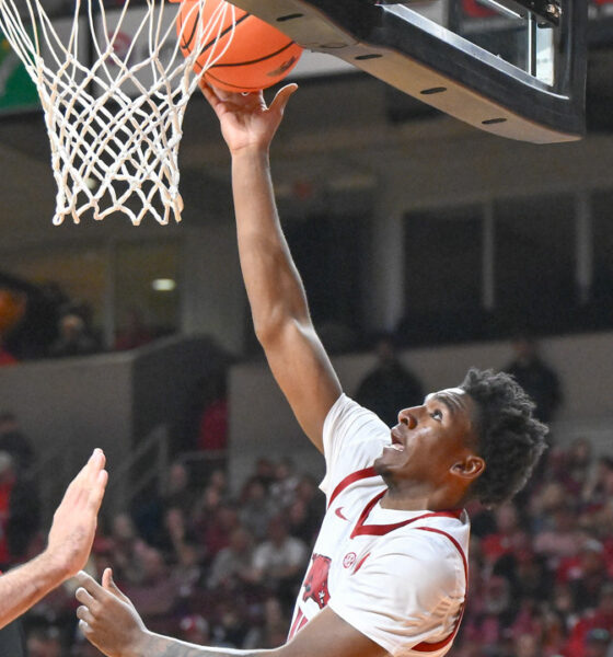 Arkansas Razorbacks guard Karter Knox laying in a shot against the Fresno State Bulldogs