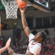 Arkansas Razorbacks guard Karter Knox laying in a shot against the Fresno State Bulldogs