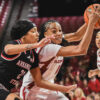 Arkansas Razorbacks guard Taleyah Jones drives the lane against the Arkansas State Red Wolves