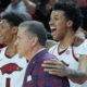 Arkansas Razorbacks coach John Calipari with players Meleek Thomas and Malique Ewin near end of win over the South Carolina Gamecocks