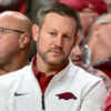 Arkansas Razorbacks coach Ryan Silverfield watching basketball game against Fresno State