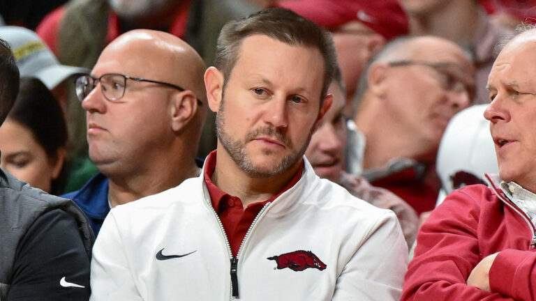 Arkansas Razorbacks coach Ryan Silverfield watching basketball game against Fresno State