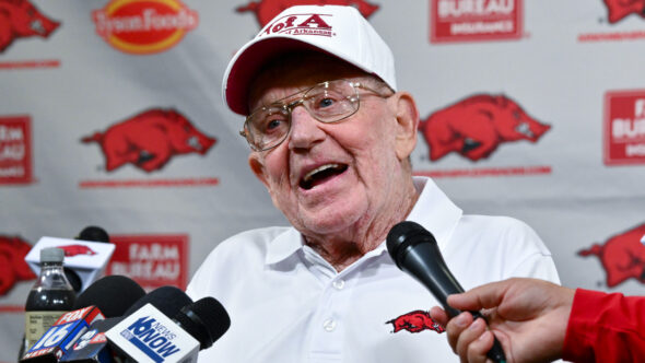Former Arkansas Razorbacks coach Lou Holtz with the media before game with Notre Dame in 2025