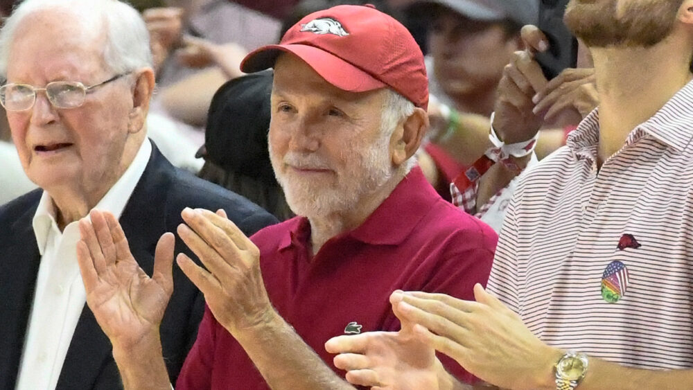 John Tyson courtside at an Arkansas Razorbacks basketball game