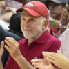 John Tyson courtside at an Arkansas Razorbacks basketball game