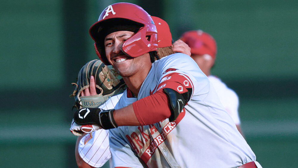 Arkansas Razorbacks TJ Pompey after hitting homer against Alabama