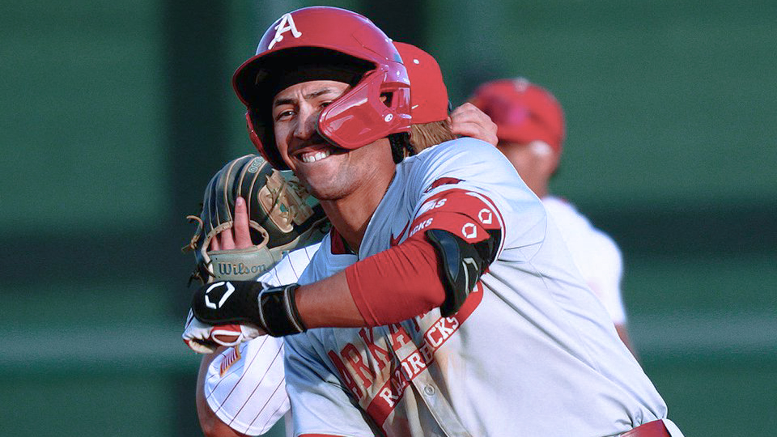 Arkansas Razorbacks TJ Pompey after hitting homer against Alabama