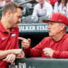Razorbacks football coach Ryan Silverfield with baseball coach Dave Van Horn