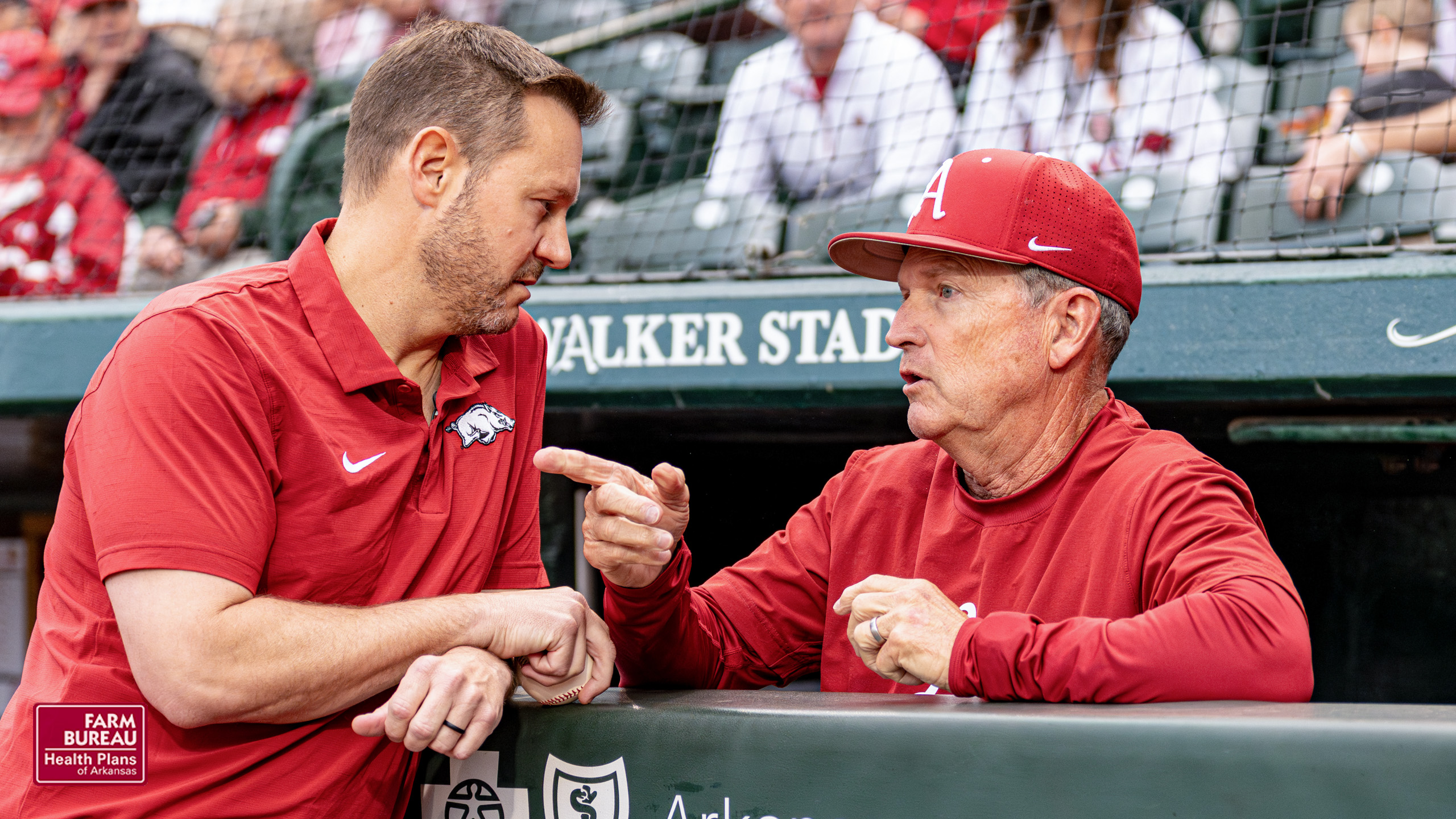 Razorbacks football coach Ryan Silverfield with baseball coach Dave Van Horn