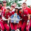 Arkansas softball players pose for photos with fans after the Razorbacks' 10-2 win against Duke that secured a spot in the Women's College World Series. | Arkansas Communications