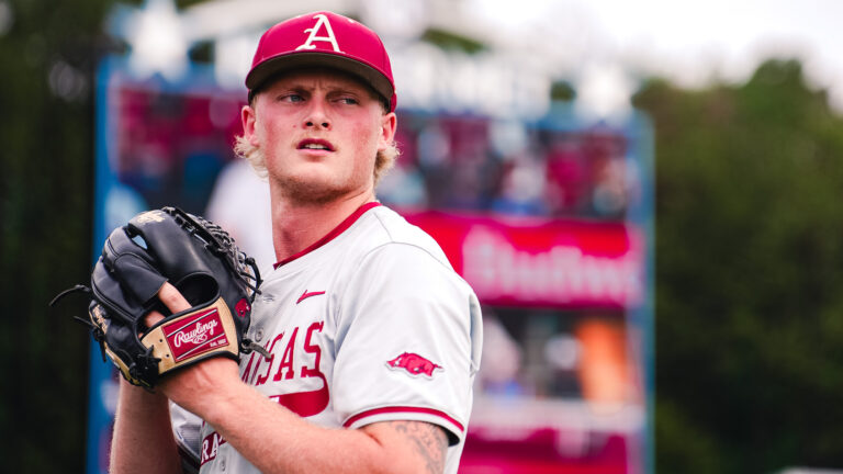 Arkansas junior pitcher Tate McGuire warms up before Sunday's SEC Championship Game against Georgia in Hoover, Ala. | Arkansas Communications