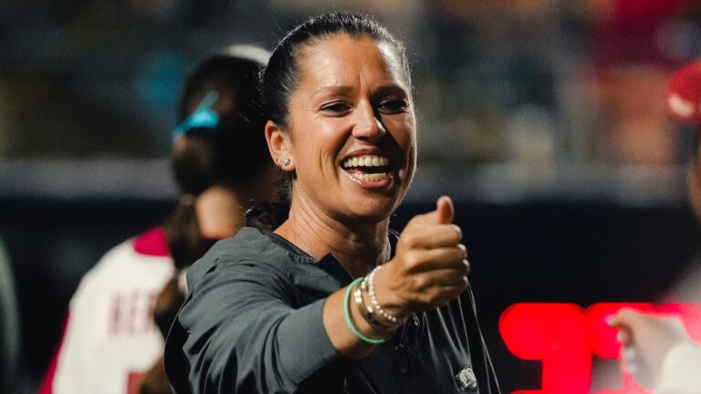 Arkansas head coach Courtney Deifel and the Razorbacks fell 5-3 in the program's first-ever WCWS game against Nebraska. | Arkansas Communications