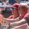 Arkansas baseball coaches discuss strategy from the dugout of a SEC game against Ole Miss in Fayetteville. | Nilsen Roman-allHogs Images