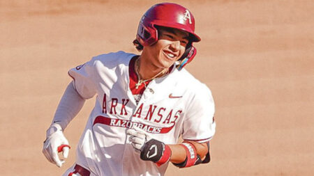 Arkansas Razorbacks first baseman Alexander Peck after hitting homer against the Oklahoma Sooners