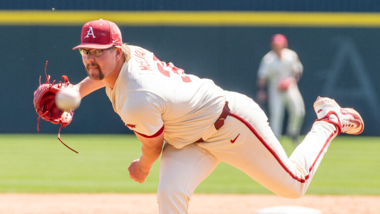 Ethan McElvain [33], pitching in the 3rd inning between Arkansas against the Florida Gators