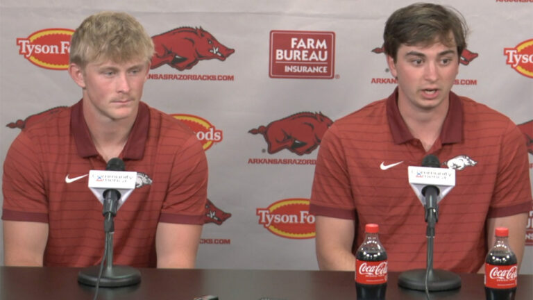 Razorback punter Gavin Rush and kicker Max Gilbert after practice Friday