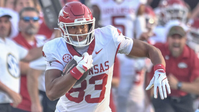 Arkansas Razorbacks tight end Jaden Platt running after a catch during a game against Ole Miss in Oxford, Miss.