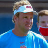 Ole Miss Rebels coach Lane Kiffin in pregame warmups before a game against the Arkansas Razorbacks at Vaught-Hemingway Stadium