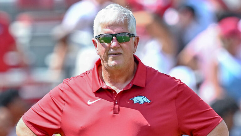 Arkansas Razorbacks defensive coordinator Ron Roberts in pregame warmups before playing North Alabama at Razorback Stadium