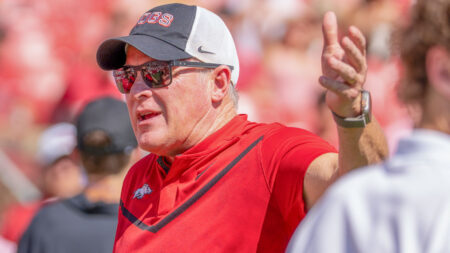 Arkansas Razorback athletic director Hunter Yurachek in pregame warmups before game against the Georgia Bulldogs at Razorback Stadium