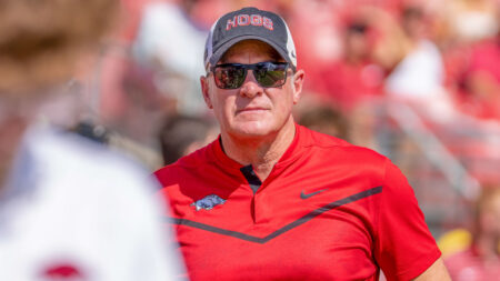 Arkansas Razorback athletic director Hunter Yurachek in pregame warmups before game against the Georgia Bulldogs at Razorback Stadium