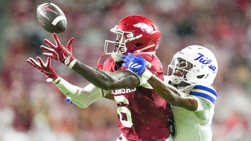 Arkansas Razorbacks wide receiver Chris Marshall runs to make a catch against the Tulsa Golden Hurricane at Razorback Stadium