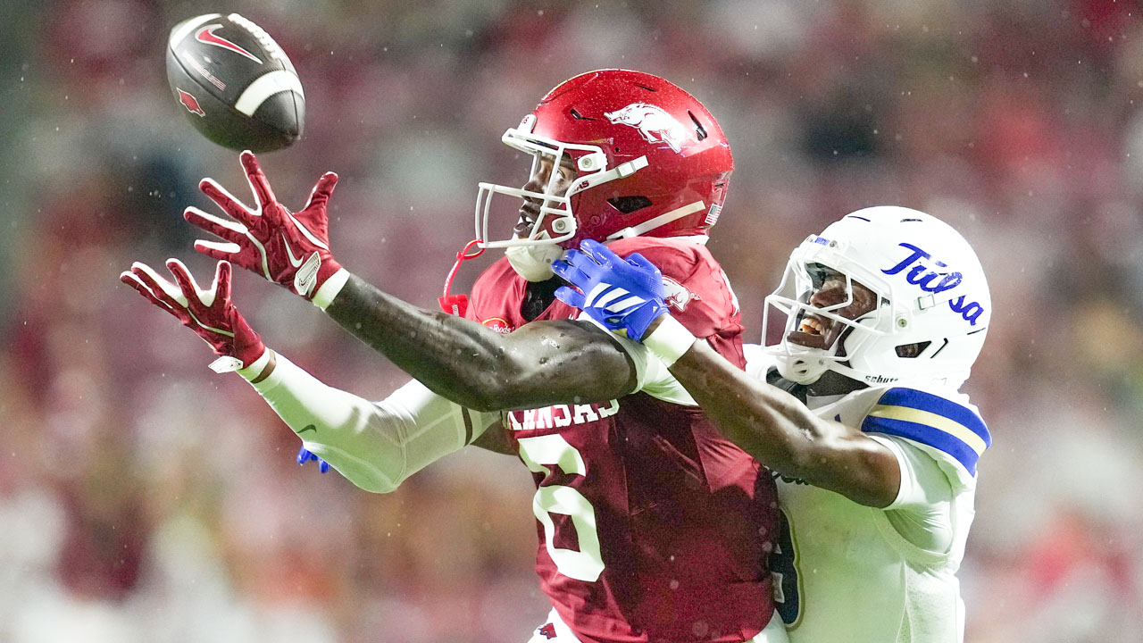 Arkansas Razorbacks wide receiver Chris Marshall runs to make a catch against the Tulsa Golden Hurricane at Razorback Stadium