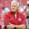 Arkansas Razorbacks defensive coordinator Ron Roberts on the field in warmups before game against the Tulsa Golden Hurricane at Razorback Stadium