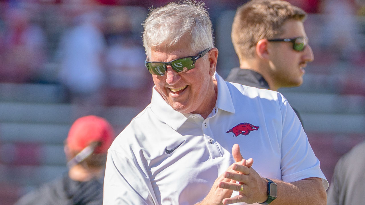 Arkansas Razorbacks defensive coordinator Ron Roberts on the field before game against the Georgia Bulldogs at Razorback Stadium