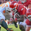Arkansas Razorbacks running back tries to get yardage in a game against the Tennessee Volunteers at Razorback Stadium