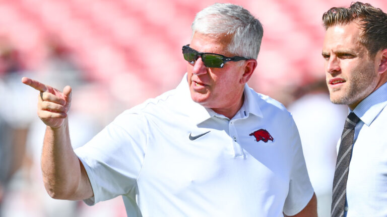 Arkansas Razorbacks defensive coordinator Ron Roberts on the field in warmups before game against the Tennessee Volunteers at Razorback Stadium