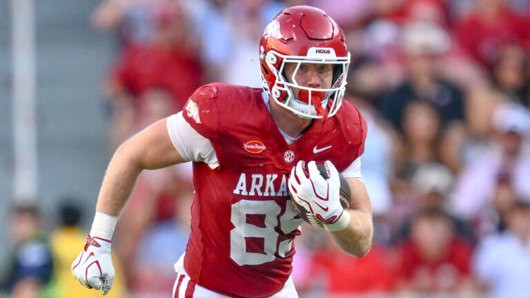 Arkansas Razorbacks tight end Ty Lockwood and defensive back Shelton Lewis during game against the Tennessee Volunteers at Razorback Stadium