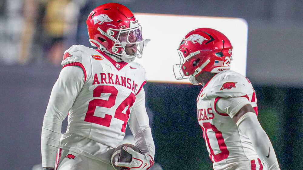 Arkansas Razorbacks defensive backs Miguel Mitchell and Joker Johnson celebrate after interception against the Vanderbilt Commodores