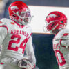 Arkansas Razorbacks defensive backs Miguel Mitchell and Joker Johnson celebrate after interception against the Vanderbilt Commodores