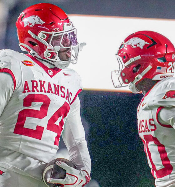 Arkansas Razorbacks defensive backs Miguel Mitchell and Joker Johnson celebrate after interception against the Vanderbilt Commodores
