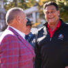 Former Arkansas Razorback football coach Sam Pittman with former Hog and Chicago Bear Dan Hampton before a game